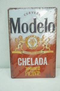lot 385 image: NEW Modelo Chelada Cerveza Metal Sign. 12x8
