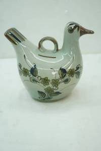 lot 446 image: Tonala Bird Coin Bank. KE Mexico Signed.