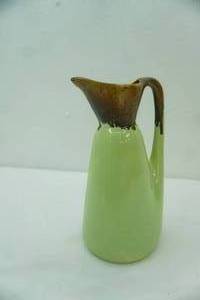 lot 464 image: Pottery Pitcher Green with Brown Drip Glaze Top