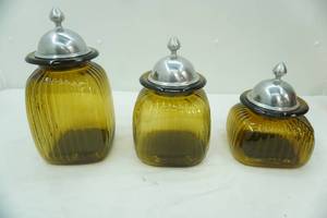 lot 579 image: Artland 3-Piece set of Amber Ribbed Glass Canisters wPewter-Style Lids (ambergreenyellow)