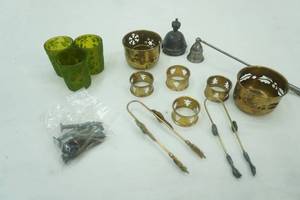 lot 698 image: Decorative Metal Candle Holders, Napkin Rings, Vintage Candle Snuffers and more