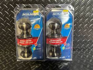 lot 57 image: Schlage F51V GEO 620 Georgian Keyed Entry Door Knob - Antique Pewter 2-Pack