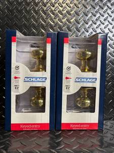 lot 75 image: Schlage Keyed Entry Door Knob Set - 2-Pack, Brass Finish