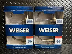 lot 87 image: Weiser Welcome Home SmartKey Keyed-Entry Lever Door Lockset - 2-Pack
