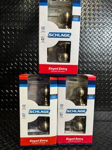 lot 115 image: Schlage Keyed Entry Doorknob Sets - Georgian Knob & Plymouth Design (Lot of 3)