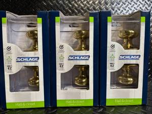 lot 117 image: Schlage Plymouth Design Hall & Closet Bright Brass Door Knobs - 4-Pack