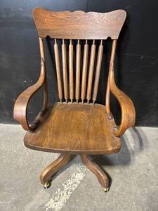 lot 14 image: Office Chair - Antique Oak Spindle-Back Swivel with Armrests & Casters