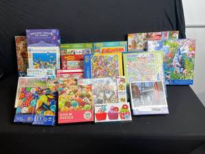 lot 82 image: Puzzle Lot - Assorted 1000-Piece Jigsaws (Ravensburger, Cobble Hill, Memory Lane, & More)