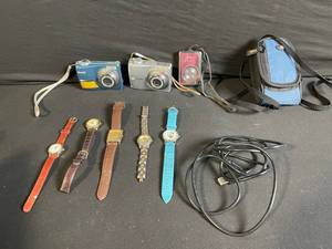 lot 115 image: Vintage Wristwatches Lot - 6 Watches  3 Compact Digital Cameras  Blue Camera Bag
