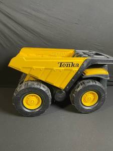 lot 179 image: Tonka Dump Truck Toy - Yellow Tilt Bed Construction Vehicle With Large Off-Road Wheels