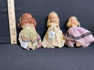lot 192 image: Three Vintage Cloth Dolls - Floral Dresses - 9 in Tall
