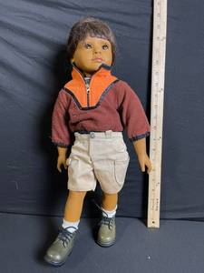 lot 209 image: Doll - Orange Zip Fleece Top with Brown Trim, Beige Shorts, Olive-Green Boots