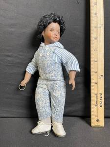 lot 214 image: Soul Kids 1960s Doll - Dark-Skinned Boy in Striped Shirt & Denim Overalls