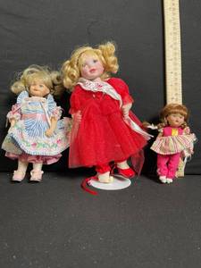 lot 228 image: Three Vintage Fashion Dolls Lot - Blue-Striped Dress, Red Tulle Gown, Pink Striped Outfit