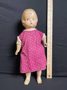 lot 239 image: Vintage Baby Doll - Vinyl Head, Pink Dress, About 15 in. tall, Damaged Head