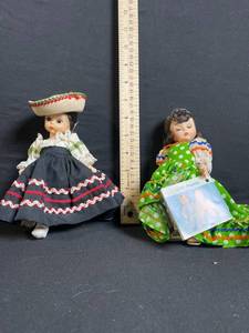 lot 245 image: Dolls - Vintage Cloth Dolls in Traditional Dresses - Navy Dress, Green Polka-Dot Dress