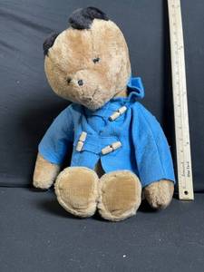 lot 261 image: Eden Toys Teddy Bear - Sewn in Haiti Blue Coat