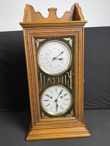 lot 284 image: Oak Mantel Clock with Calendar Dial - Roman Time Dial in Carved Case