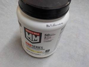 lot 116 image: 32 oz jug Pro Series Muscle Milk Pr...