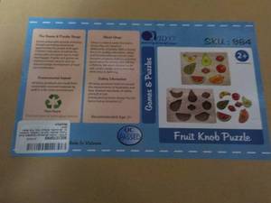 lot 131 image: Wood Fruit Knob Puzzle...