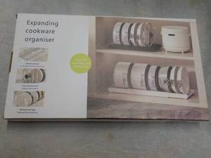 lot 141 image: Expanding Cookware Organizer...