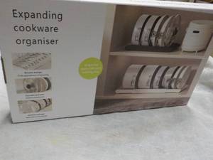 lot 143 image: Expanding Cookware Organizer...