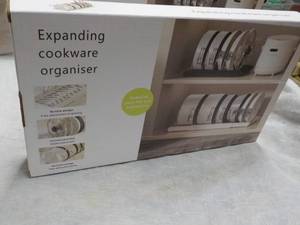 lot 144 image: Expanding Cookware Organizer...