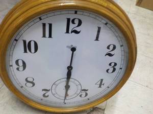 lot 251 image: Round 24 diameter Battery Wall Clo...