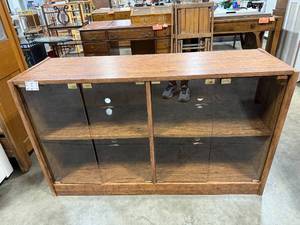 lot 44 image: Wood and Glass Display Cabinet with Sliding Doors 50x29x16 in