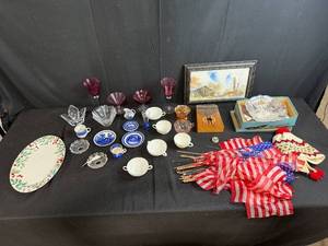 lot 84 image: Eclectic Collection of Glassware, Porcelain, Art, Flags, and Decorative Items