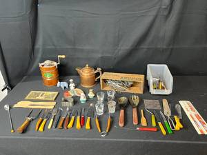 lot 134 image: Vintage Kitchen and Utensil Lot with Ice Cream Maker, Copper Teapot, and Collectibles