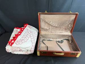 lot 165 image: Vintage Brown Suitcase with Red and White Handmade Quilt