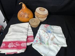 lot 210 image: Decorative Gourd with Deer, Two Woven Baskets, and Vintage Textiles Collection