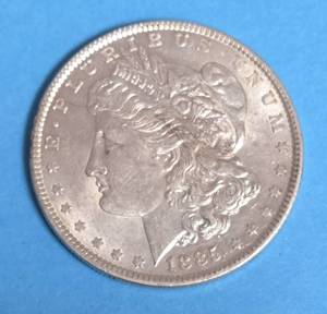 lot 40 image: 1885 Morgan Silver Dollar (Scarface)
