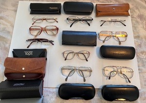 lot 181 image: Collection of 7 Vintage and Designer Eyeglasses with Cases and extra cases