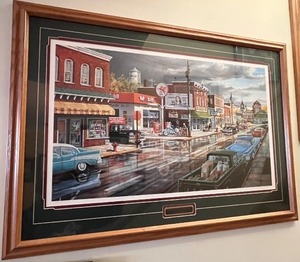 lot 193 image: Reflections of Main St. Framed Limited Edition Print by Ken Zylla