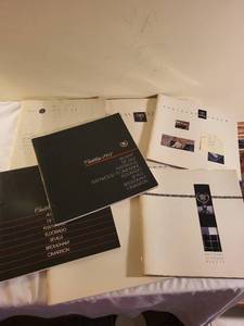 lot 355 image: Set of Cadillac Sales Brochures 1987 and 1990