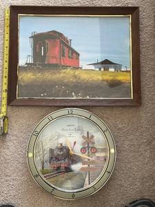 lot 106 image: Panclox Hourly Sound Effects Quartz Clock - Train Scene Wall Clock & Framed Rail Painting