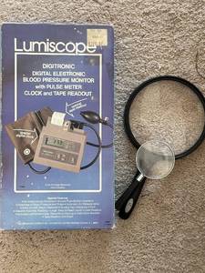 lot 107 image: Lumiscope Digitronic Digital Blood Pressure Monitor with Pulse Meter Clock & Tape Readout