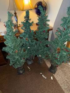 lot 216 image: 4 Artificial Christmas Trees in Ornate Urn Planters - Holiday Decor