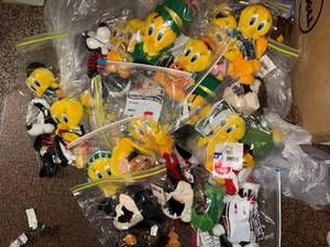 lot 227 image: Yellow Duck Plush Toys - Assorted Cartoon Character Stuffed Animals In Zip Bags