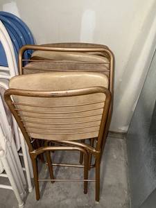 lot 232 image: Vintage Stackable Metal Chairs - Tan Vinyl Cushions (Lot of 3)