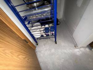 lot 243 image: Blue Metal Rolling Shelf Rack on Wheels - 4-Tier Wire Storage Unit