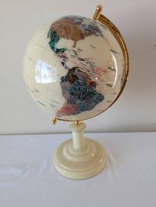 lot 15 image: Decorative World Globe with Cream Base and Gold-Tone Axis
