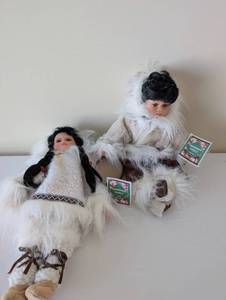 lot 45 image: Pair of Heritage Porcelain Dolls in Traditional Inuit-Inspired Costume