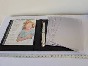 lot 81 image: Shirley Temple Stamp Panels Album by Postal Commemorative Society