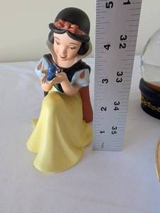 lot 110 image: Disney Collectible Lot Snow White, Mickey Mouse Snow Globe, and 7 Japan Porcelain Figurines