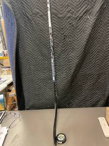 lot 57 image: Junior Right Forte Stick with 20 oz Official Hockey Puck