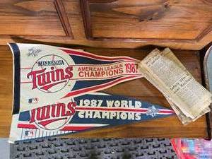 lot 79 image: 1987 MN Twins World Series banner and newspaper