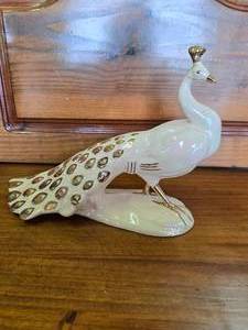 lot 104 image: Beautiful Peacock ceramic with gold accents